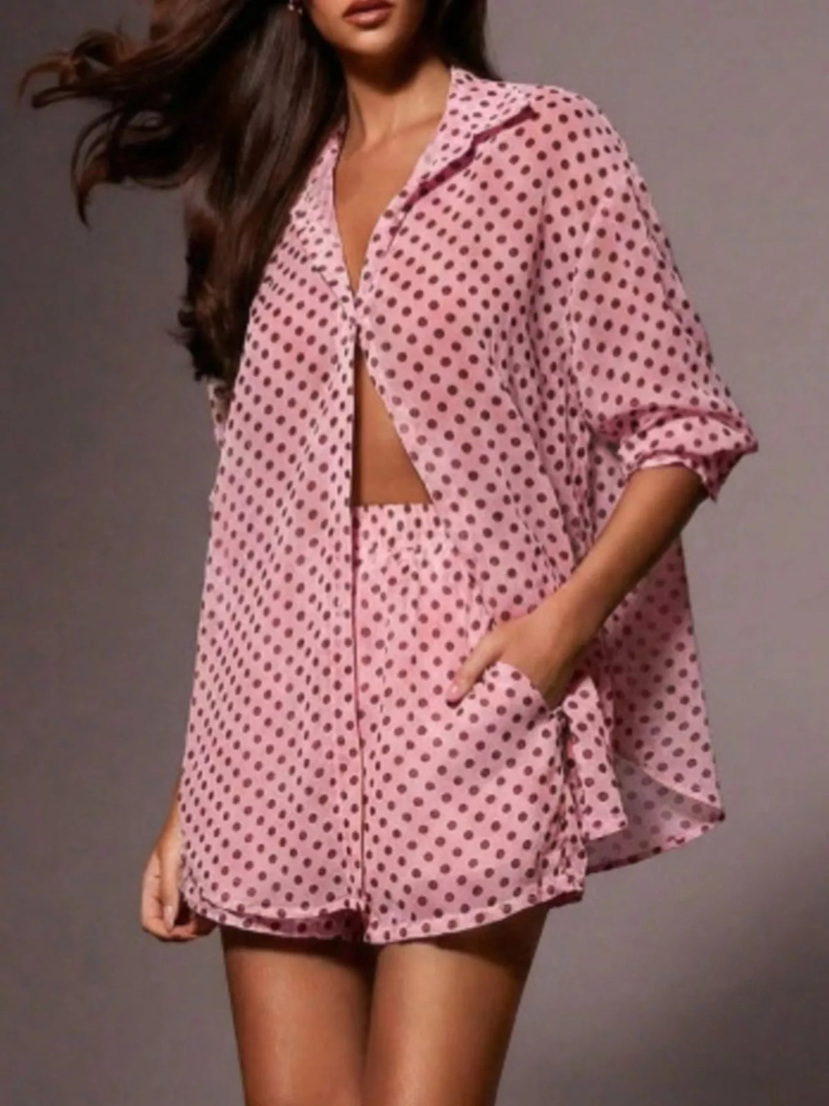 Polka dot button-up shirt and shorts loungewear set by Plush Fashion Hub, featuring a relaxed fit and playful pattern.