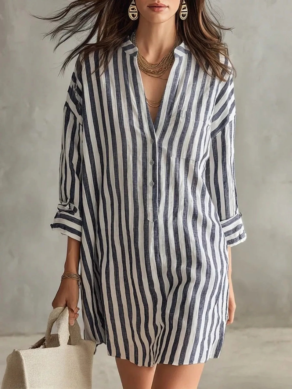 Plus size striped shirt dress with 3/4 sleeves by Trendsi, featuring a casual fit and stylish design.
