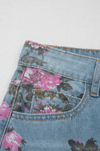Esme floral print bootcut jeans by Threaded Pear featuring vibrant floral patterns and classic denim fit.