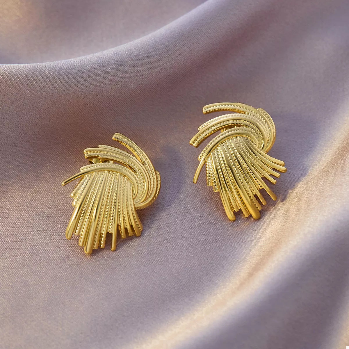 Gold-plated textured stud earrings from Plush Fashion Hub, featuring a sleek, modern design in 18K gold plating.