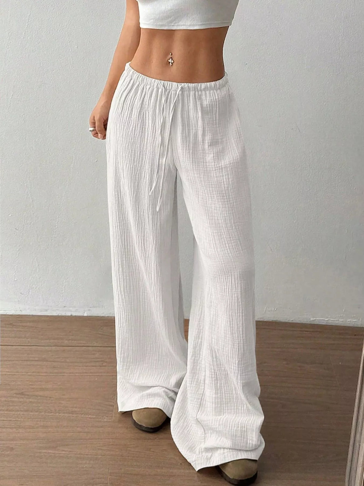 Plush Fashion Hub wide-leg drawstring pants in soft fabric, featuring a relaxed fit and casual style.