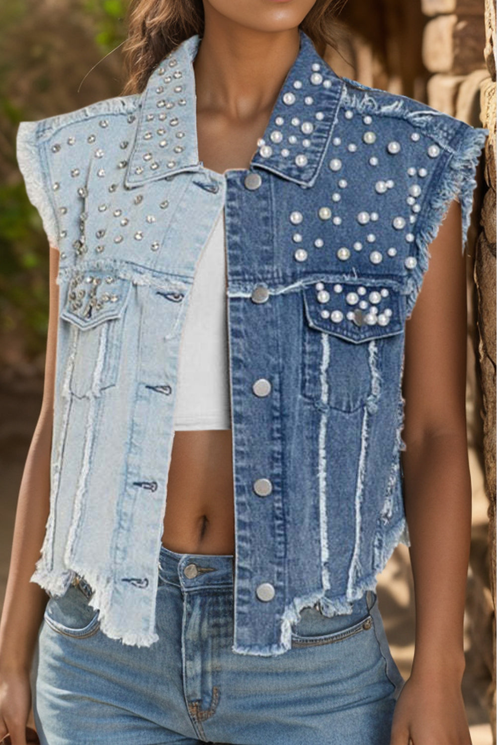 Pearl raw hem sleeveless denim jacket by Plush Fashion Hub, featuring a casual fit with pearl embellishments and raw hem details.