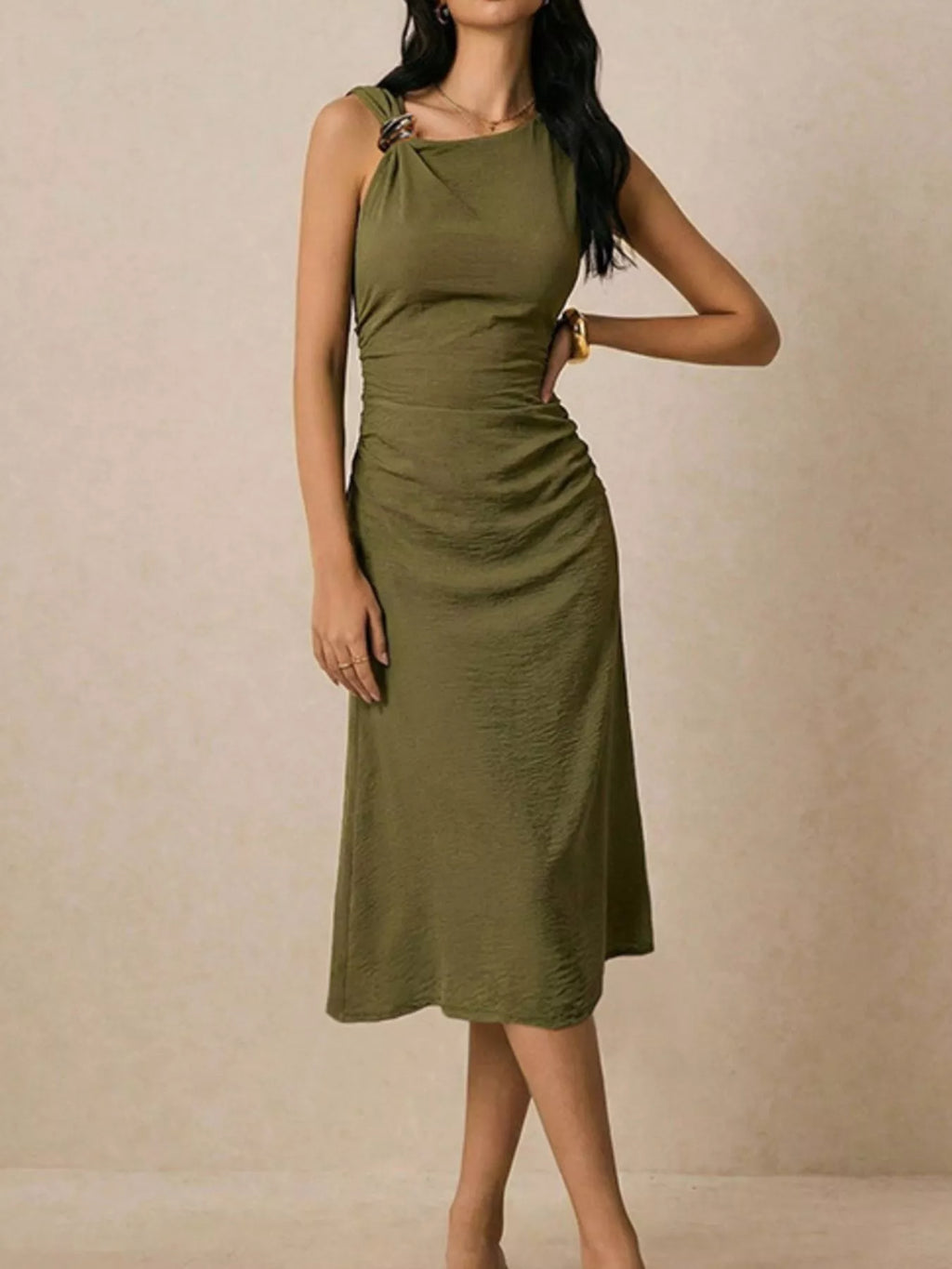 Asymmetrical neck ruched midi dress by Trendsi featuring a stylish design with a fitted silhouette and elegant ruching details.