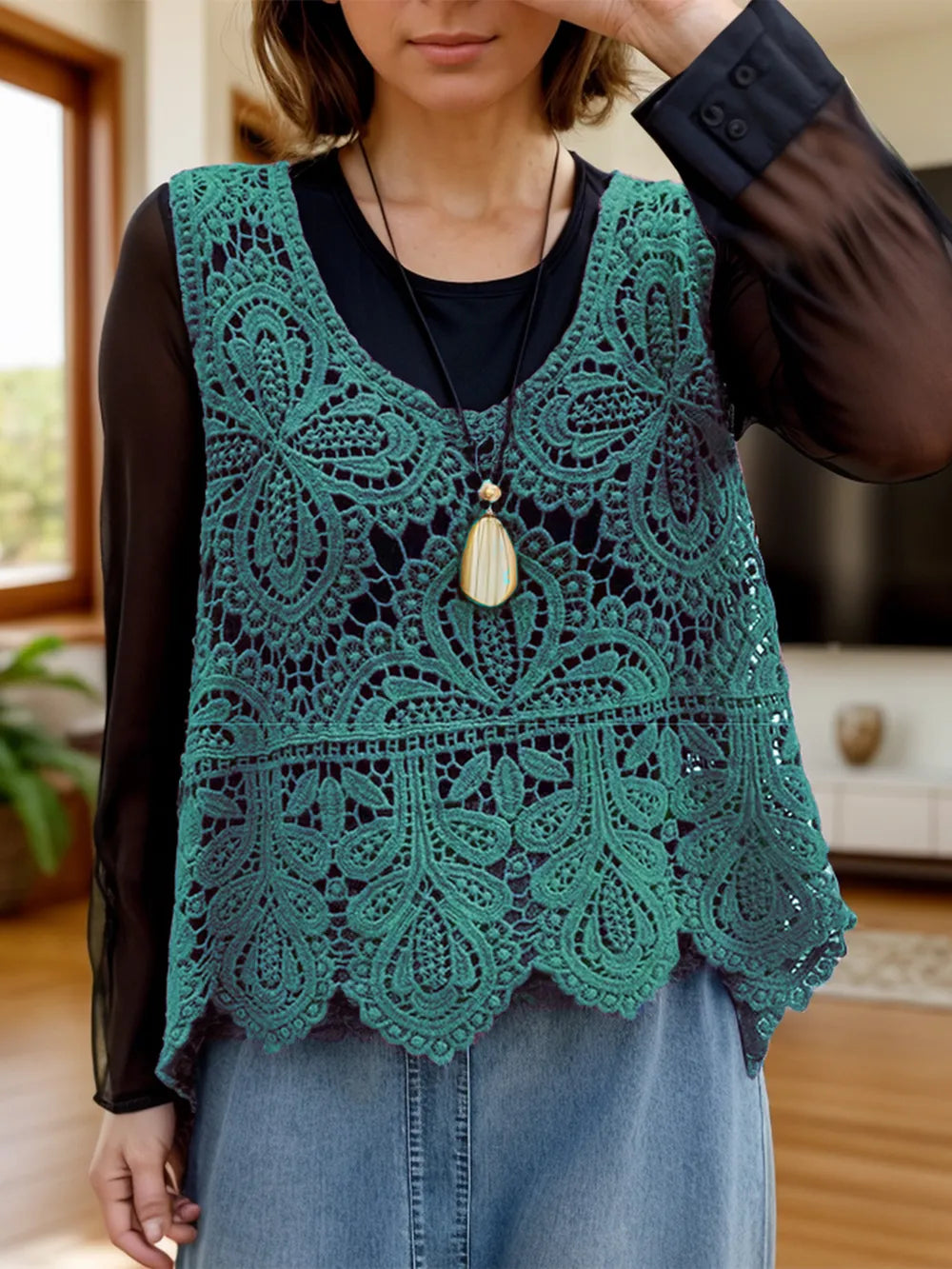 Sleeveless knit swim cover-up with a cutout scoop neck from Trendsi, perfect for beach or poolside fashion.