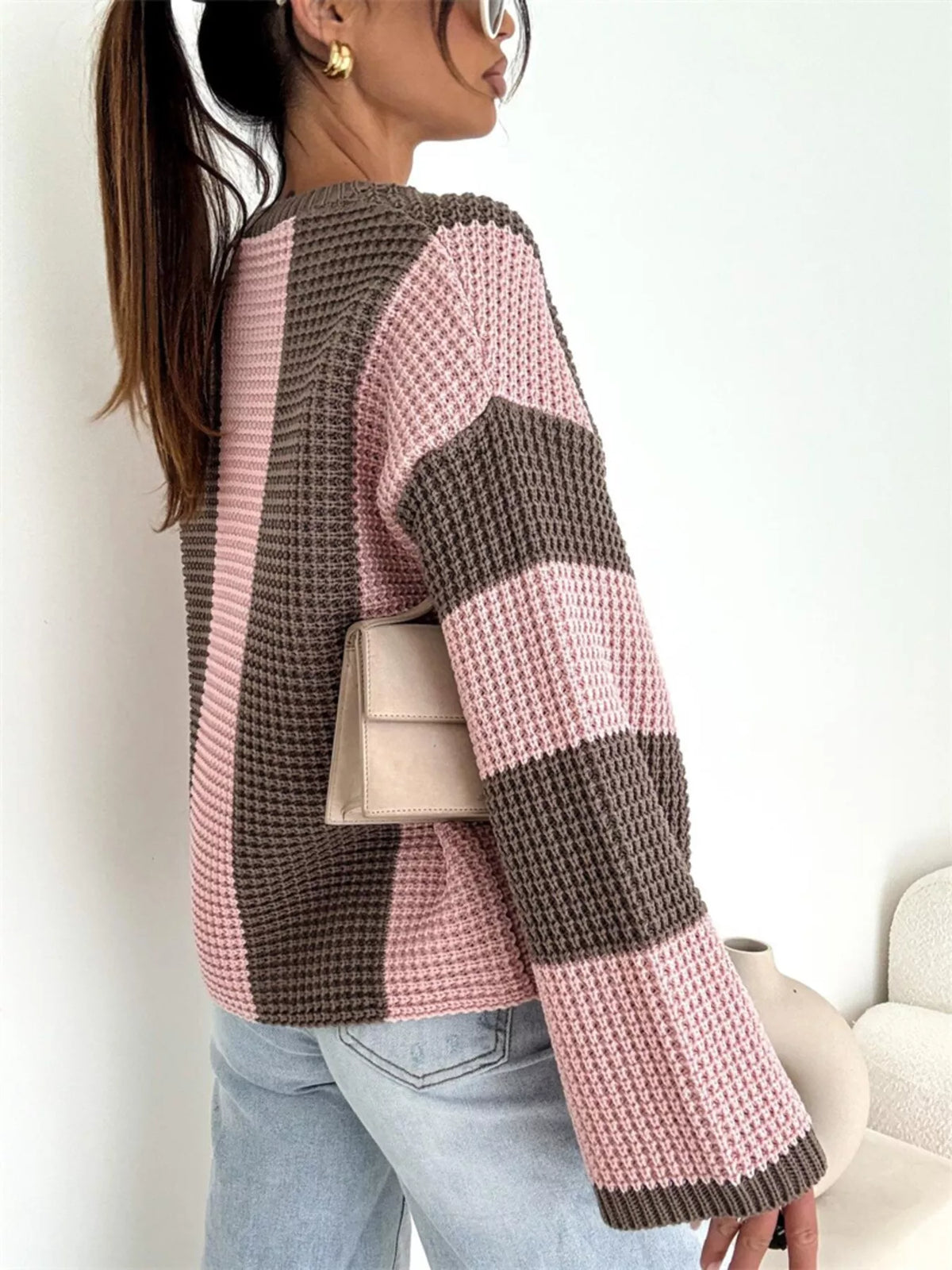Color block long sleeve sweater by Trendsi, featuring bold color blocks and a cozy knit design.