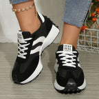 Women's round toe lace-up flat sneakers by Trendsi, made of comfortable PU leather, casual footwear with a sleek design.