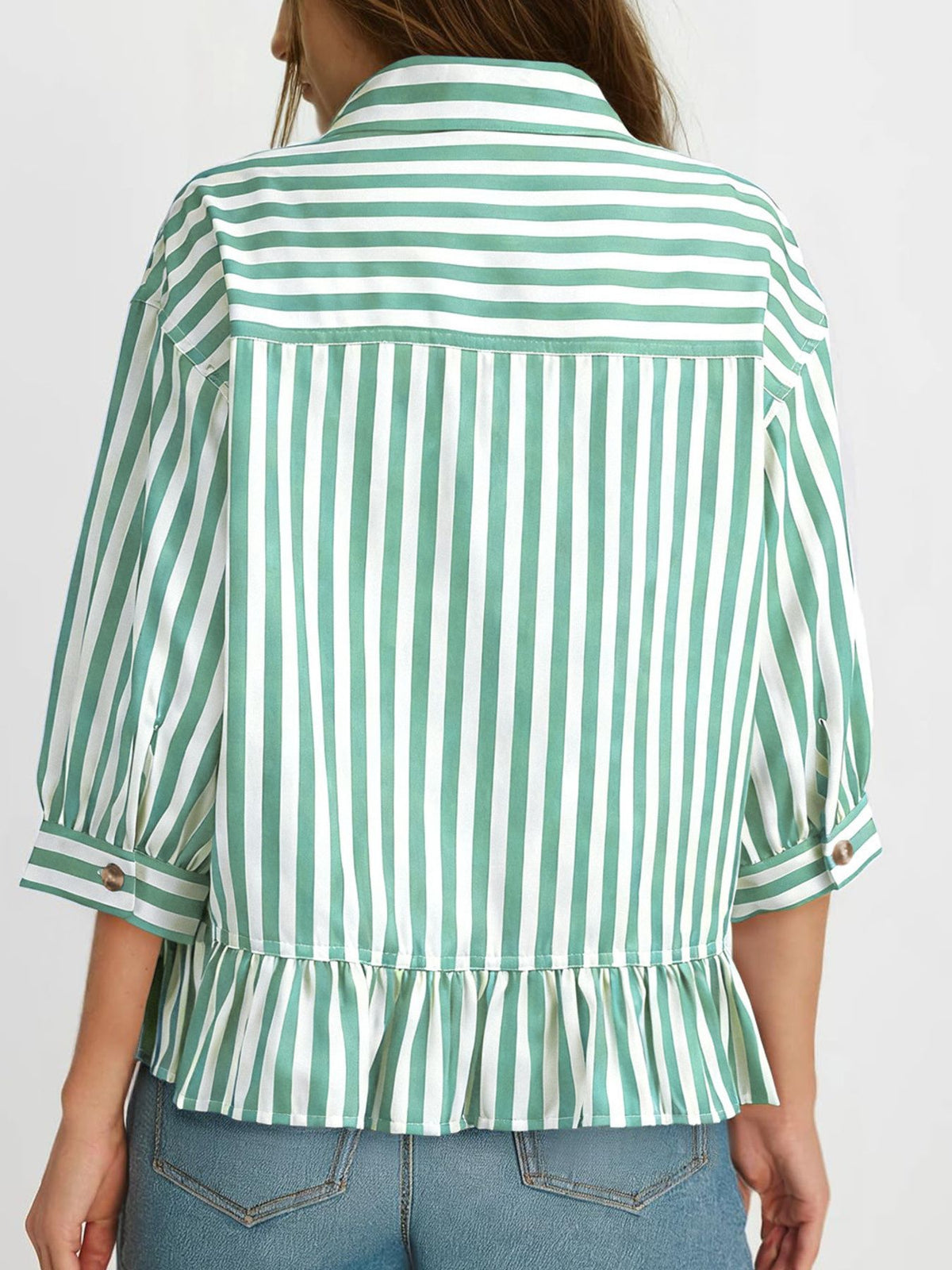 Women’s striped button-down blouse by Plush Fashion Hub, lightweight viscose fabric with ruffled hem and stylish design.