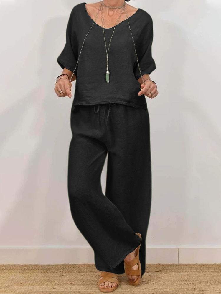 Women’s multi-color two-piece casualwear set with a V-neck top and matching pants by Plush Fashion Hub.
