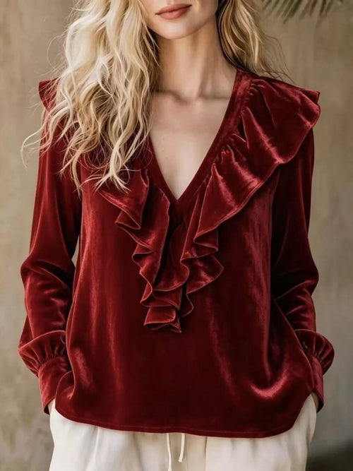 Plus size ruffled V-neck long sleeve blouse by Trendsi, shown in full size with flattering fit and stylish design.