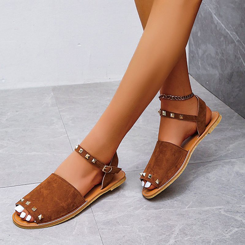 Rivet Sandals Summer Fish Mouth Shoes For Women Flat Beach ShoesElevate your summer shoe game with our Rivet Sandals! These Roman style sandals feature a comfortable fish mouth toe shape and a shallow mouth design. The frosted prSandalsPlush Fashions ShopPlush Fashion Shop