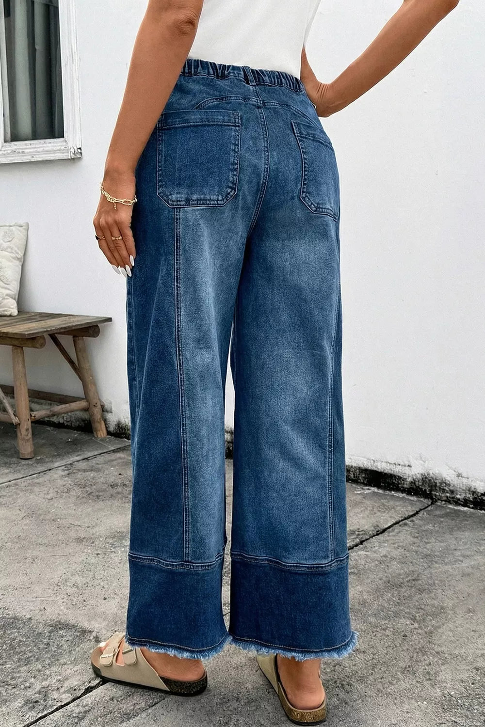 Wide-leg denim pants with drawstring waist, seam details, and raw hem from Plush Fashion Hub, casual and stylish for everyday wear.
