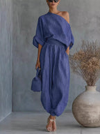Trendsi one-shoulder loungewear set with matching joggers, stylish and comfortable for casual wear, shown in a relaxed fit.