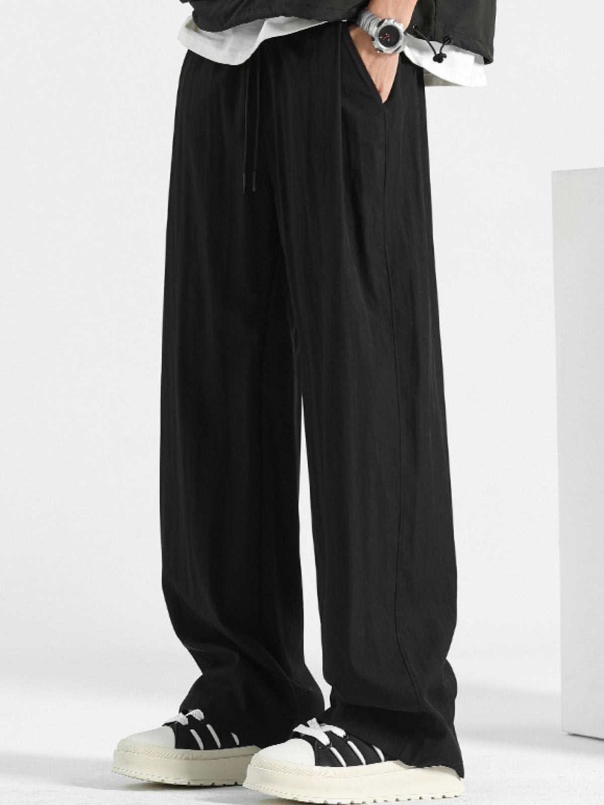 Men's loose fit drawstring casual pants from Plush Fashion Hub, showing the relaxed fit and adjustable waistband.