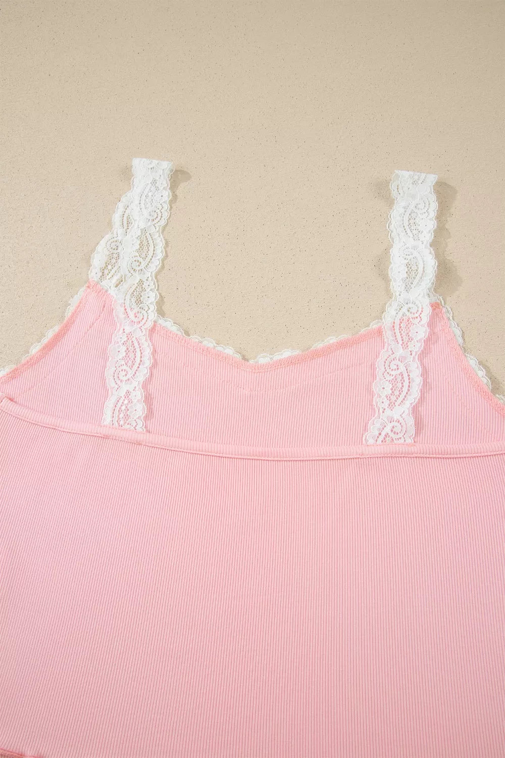 Ribbed knit lace straps patchwork cropped top with lettuce hem, floral lounge set by Trendsi, featuring short sleeves and a relaxed fit.