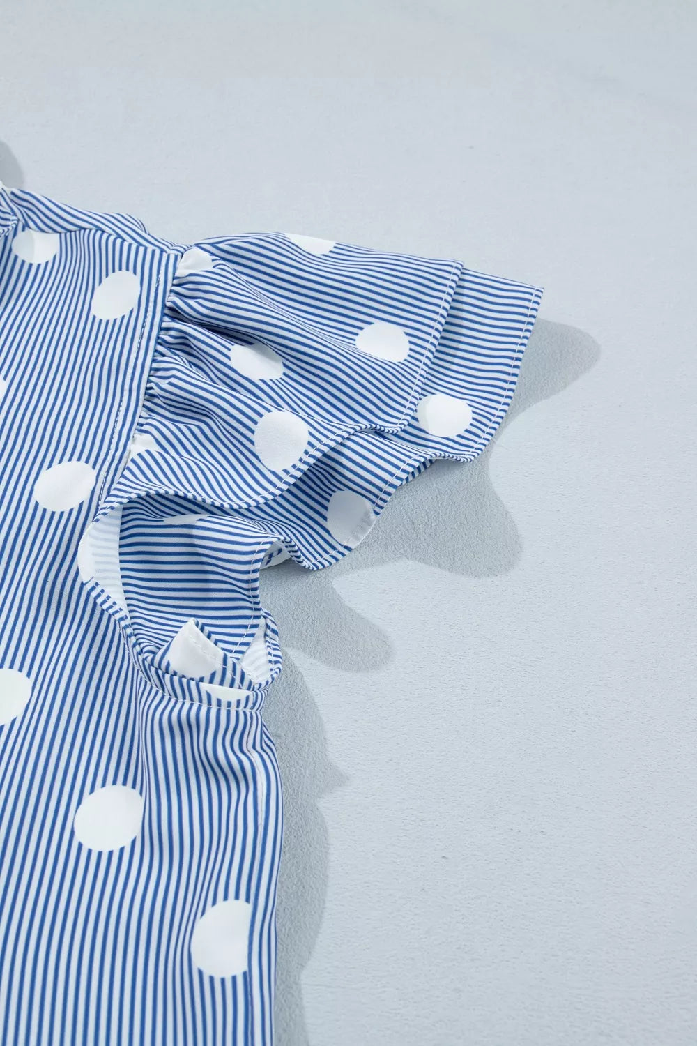 Plush Fashion Hub Stripe contrast polka dot print pleated ruffle sleeve shirt, stylish and lightweight with a feminine design.