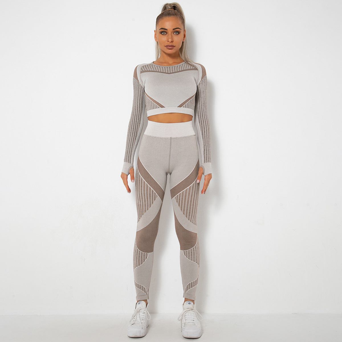 Seamless Knitted Absorbent Yoga Long-Sleeved SuitExperience ultimate comfort and style in this Seamless Knitted Absorbent Yoga Long-Sleeved Suit. The breathable fabric, consisting of 70% nylon, 20% polyester, and 1Yoga SetPlush Fashions ShopPlush Fashion Shop