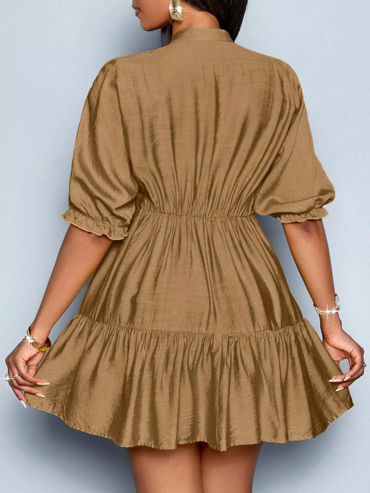 Notched half sleeve tiered dress by Plush Fashion Hub with flowy fabric and layered design, perfect for casual or semi-formal occasions.
