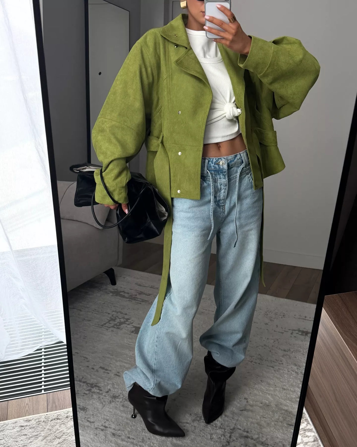 Women's tie waist long sleeve cropped jacket by Trendsi, featuring a stylish fit and versatile design, shown on a model.