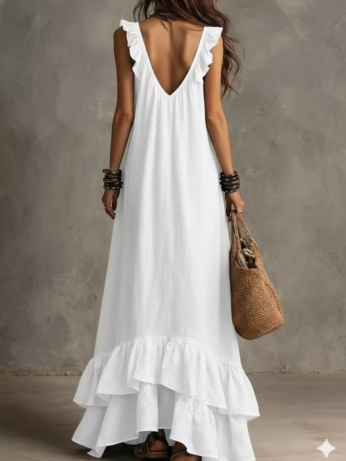 Plush Fashion Hub ruffled sleeveless maxi dress with flowing fabric and elegant design, perfect for summer or special occasions.
