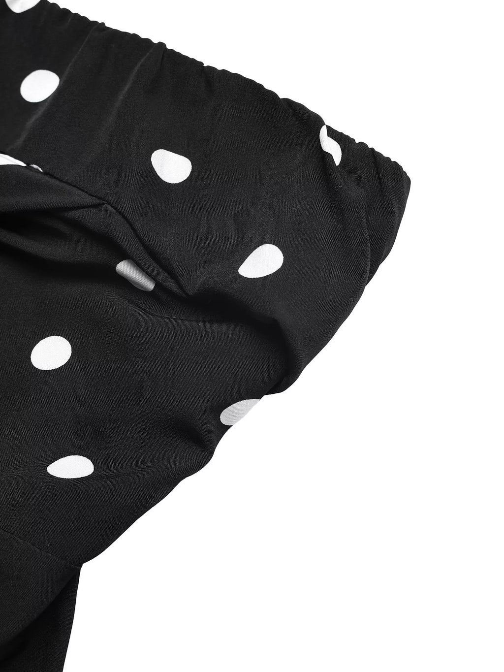 Polka dot strapless wide-leg jumpsuit by Trendsi featuring a flowy, comfortable design and stylish fashion statement.