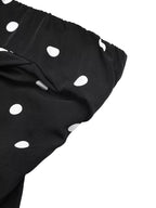 Polka dot strapless wide-leg jumpsuit by Trendsi featuring a flowy, comfortable design and stylish fashion statement.