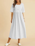 Plus size midi dress from FitiqueFit featuring a round neck, pocket details, perfect for casual wear.