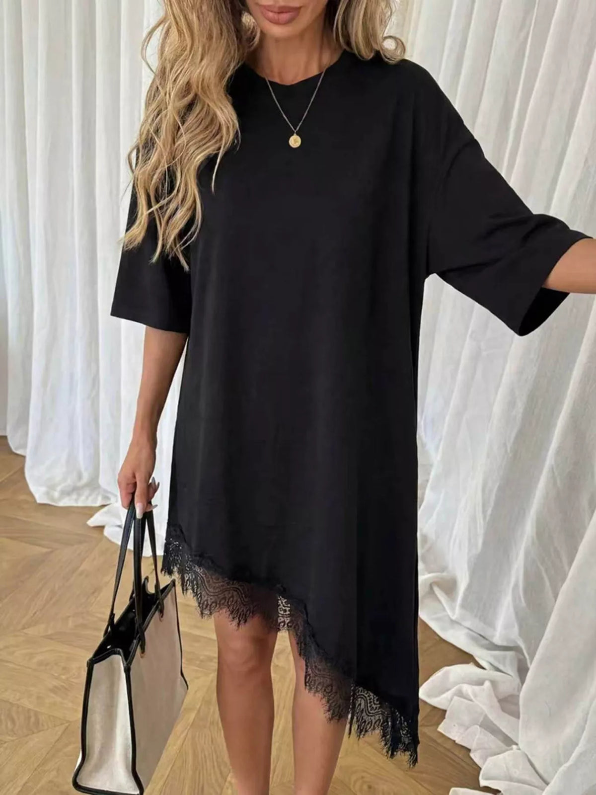 Lace trim asymmetrical hem T-shirt dress by Plush Fashion Hub featuring a casual shirt dress design with decorative lace details.