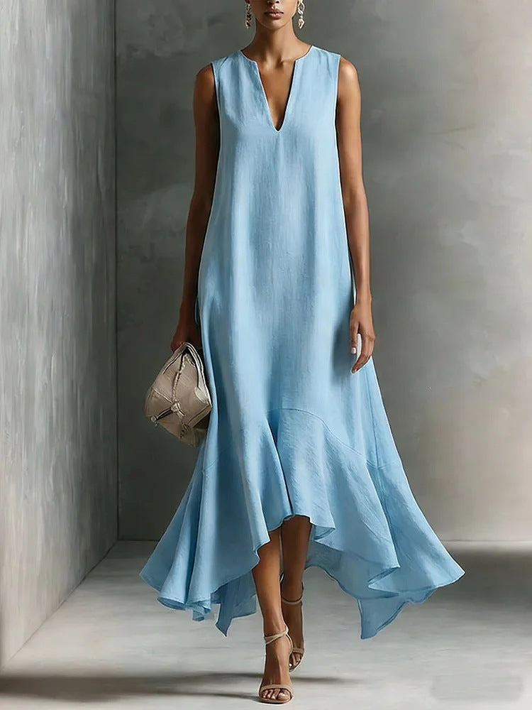 Women's deep V-neck sleeveless asymmetrical maxi dress with patchwork design by FitiqueFit, featuring flowing fabric and stylish silhouette.