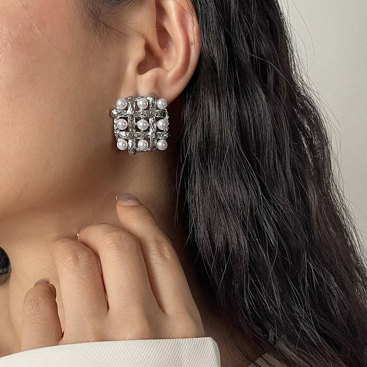 Pearl grid square stud earrings by Plush Fashion Hub featuring elegant white pearls on a geometric square design.