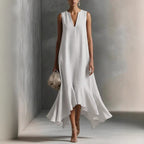 Women's deep V-neck sleeveless asymmetrical patchwork maxi dress by FitiqueFit, featuring flowing fabric and stylish design.