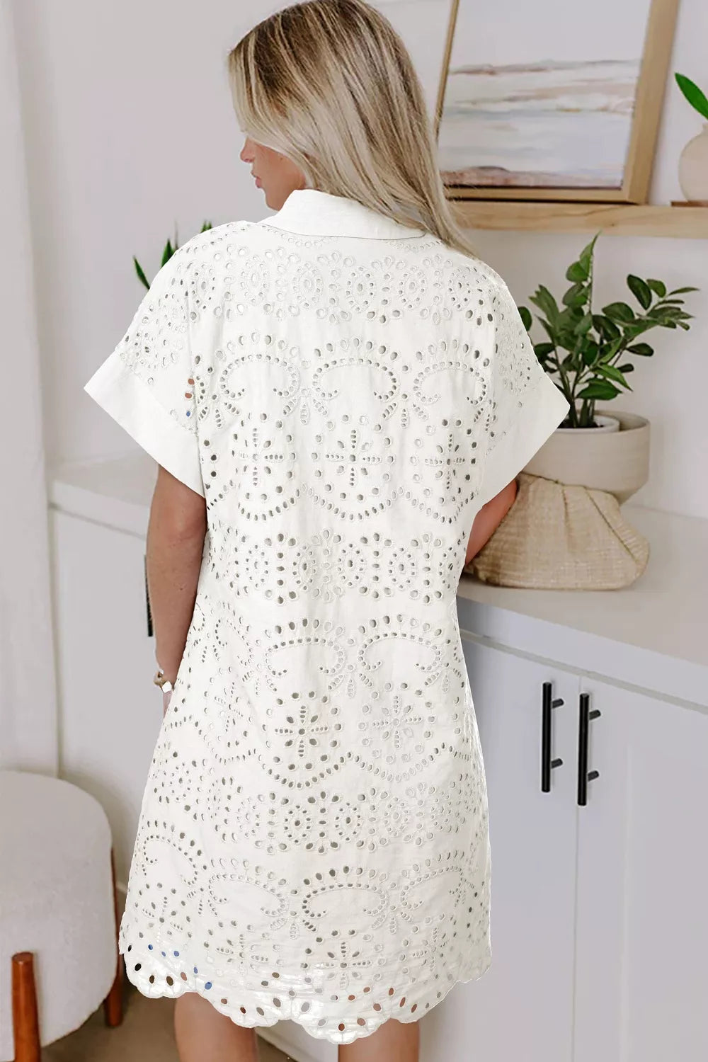 Solid color eyelet embroidered T-shirt mini dress by Plush Fashion Hub, featuring eyelet details and casual, stylish design.