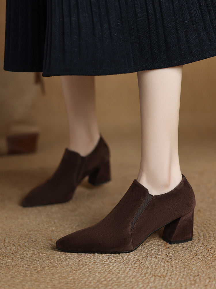 Women's suede pointed toe chunky heel pumps with deep vamp and low heel, stylish footwear by Plush Fashion Hub.