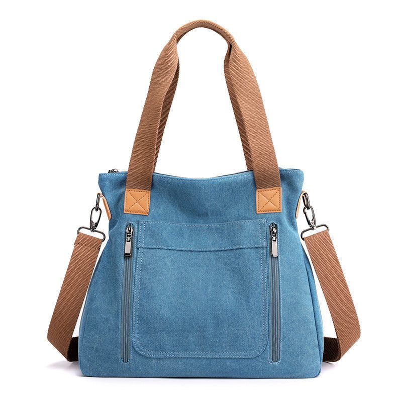 Women Large-capacity Canvas Casual Shoulder BagsBe stylish and organized with our Women's Large-capacity Canvas Casual Shoulder Bags. Made with soft canvas fabric, this bag is perfect for business or casual outingHandbagsPlush Fashions ShopPlush Fashion Shop