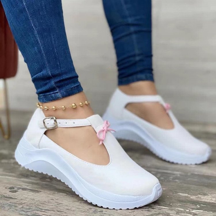 LadyShow.Store platform buckle fringe casual sneakers with solid color suede, featuring fringe details and a chunky sole.