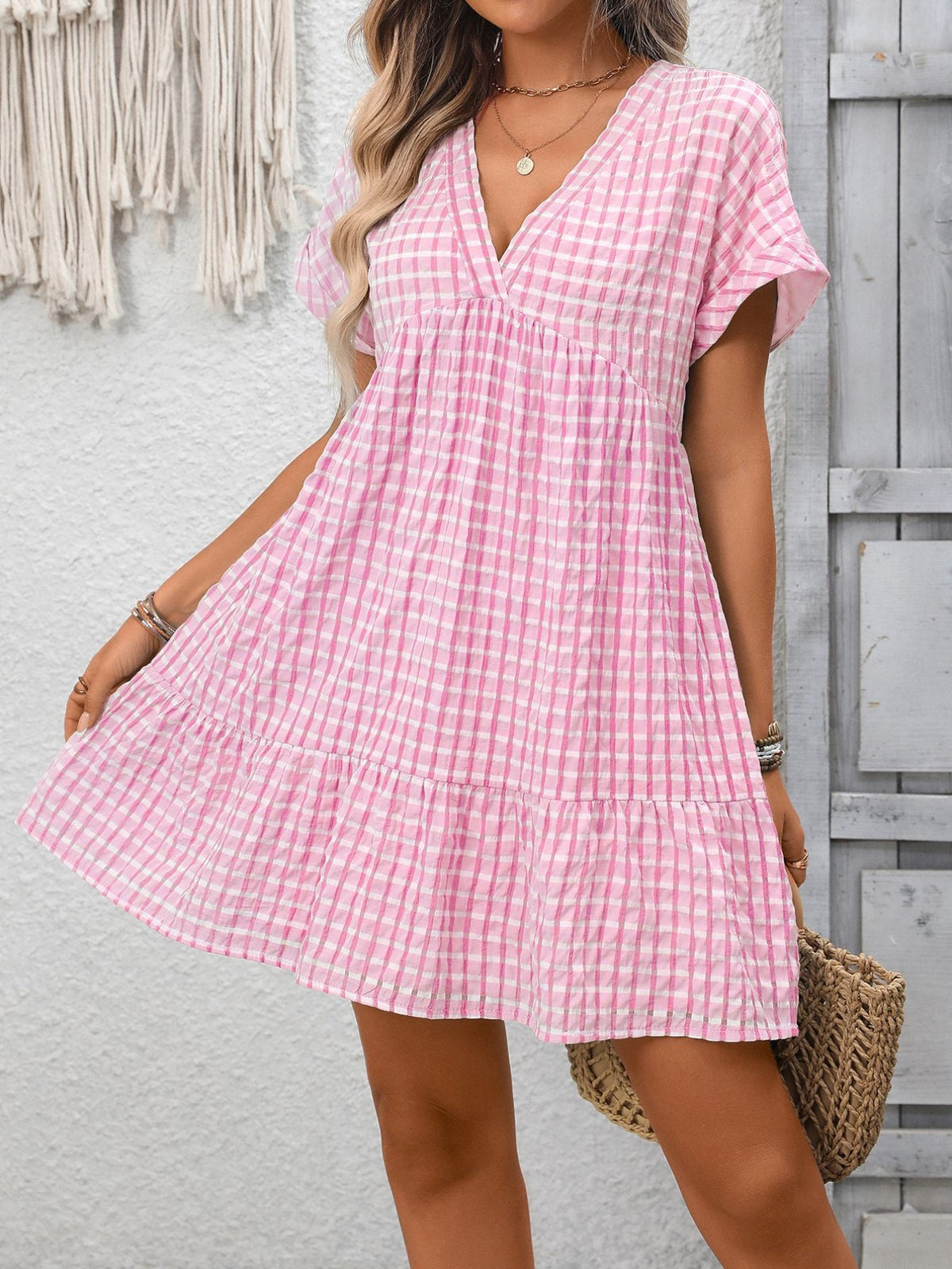 Plush Fashion Hub chic plaid v-neck mini dress with ruffle hem, featuring a stylish and feminine design.