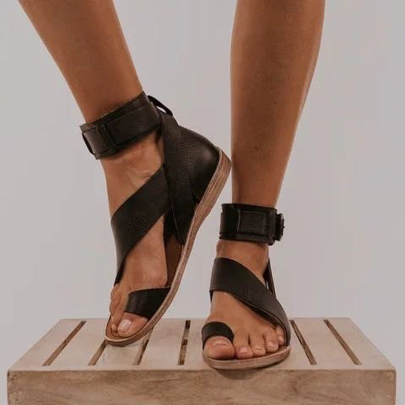 Plus size Roman style women's buckle toe slippers flat sandals by LadyShow.Store, featuring comfortable flat design and stylish buckle detail.