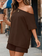 Plus size one shoulder top and shorts set by Trendsi, featuring a stylish, full-size casual outfit with a trendy design.