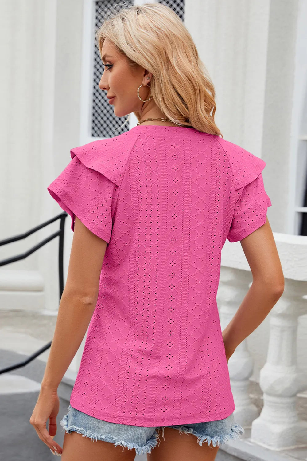 Plush Fashion Hub eyelet notched flutter sleeve T-shirt with relaxed fit, lightweight cotton fabric, and stylish sleeve detailing.