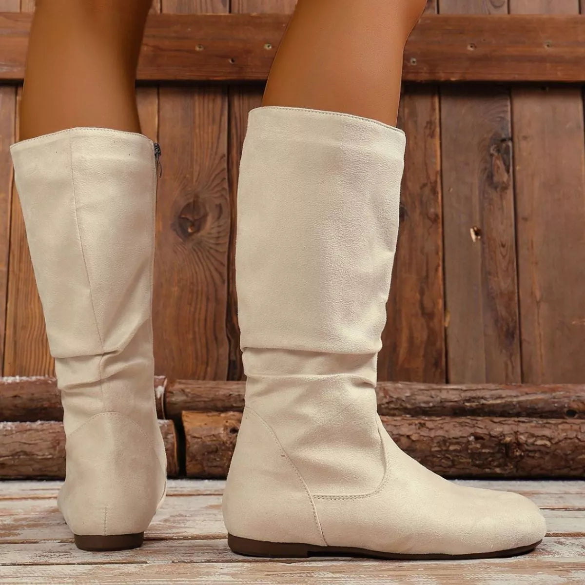 Trendsi round toe side zip boots showing black leather boots with a sleek silhouette and side zipper detail.