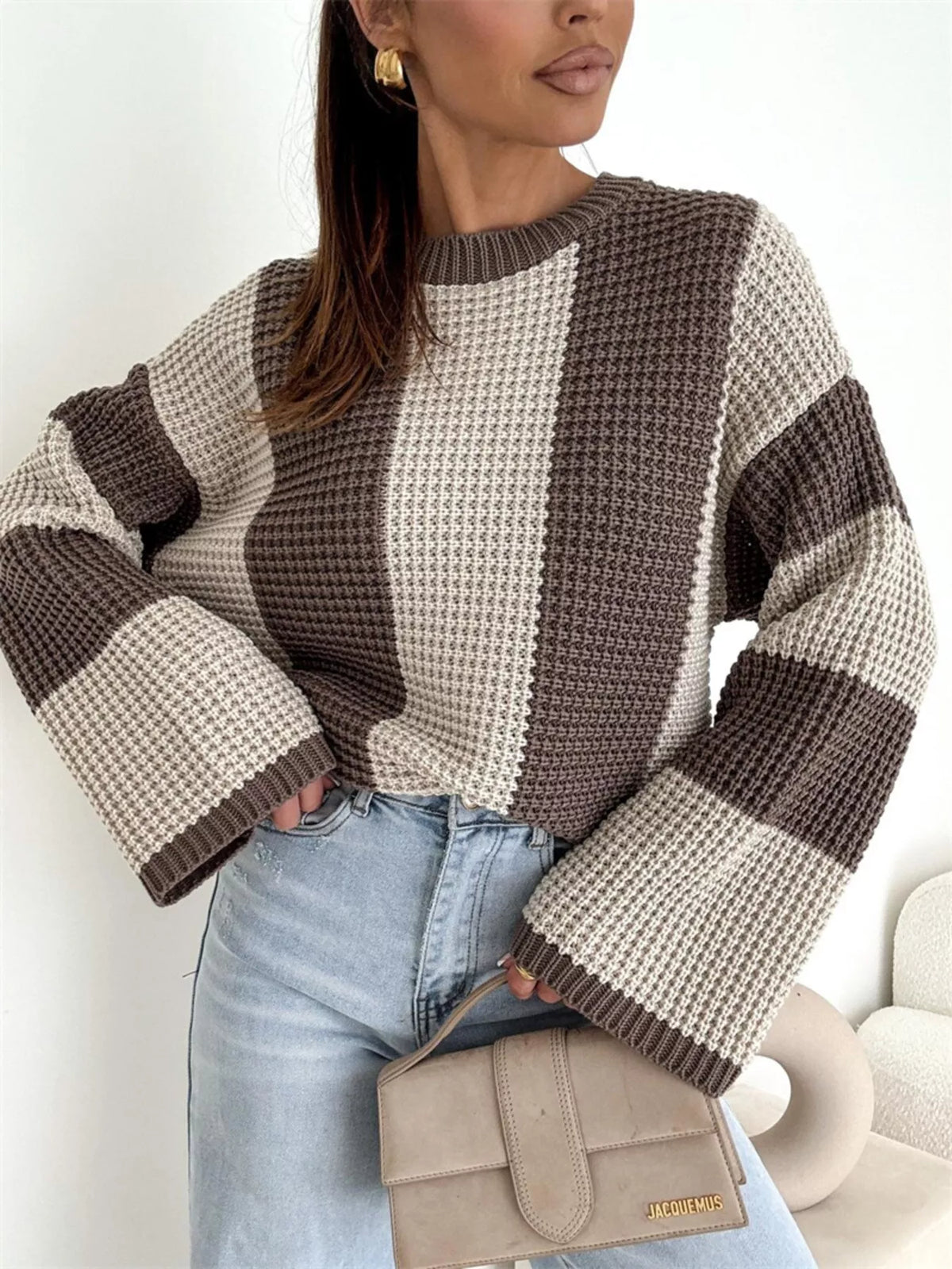 Color block long sleeve sweater by Trendsi, featuring vibrant color blocking and cozy knit fabric, shown on a model.