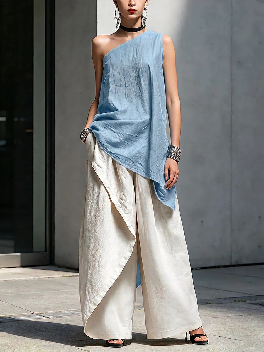 Women's one-shoulder asymmetric sleeveless top by Plush Fashion Hub, shown in a stylish, fitted design with a unique shoulder cut.