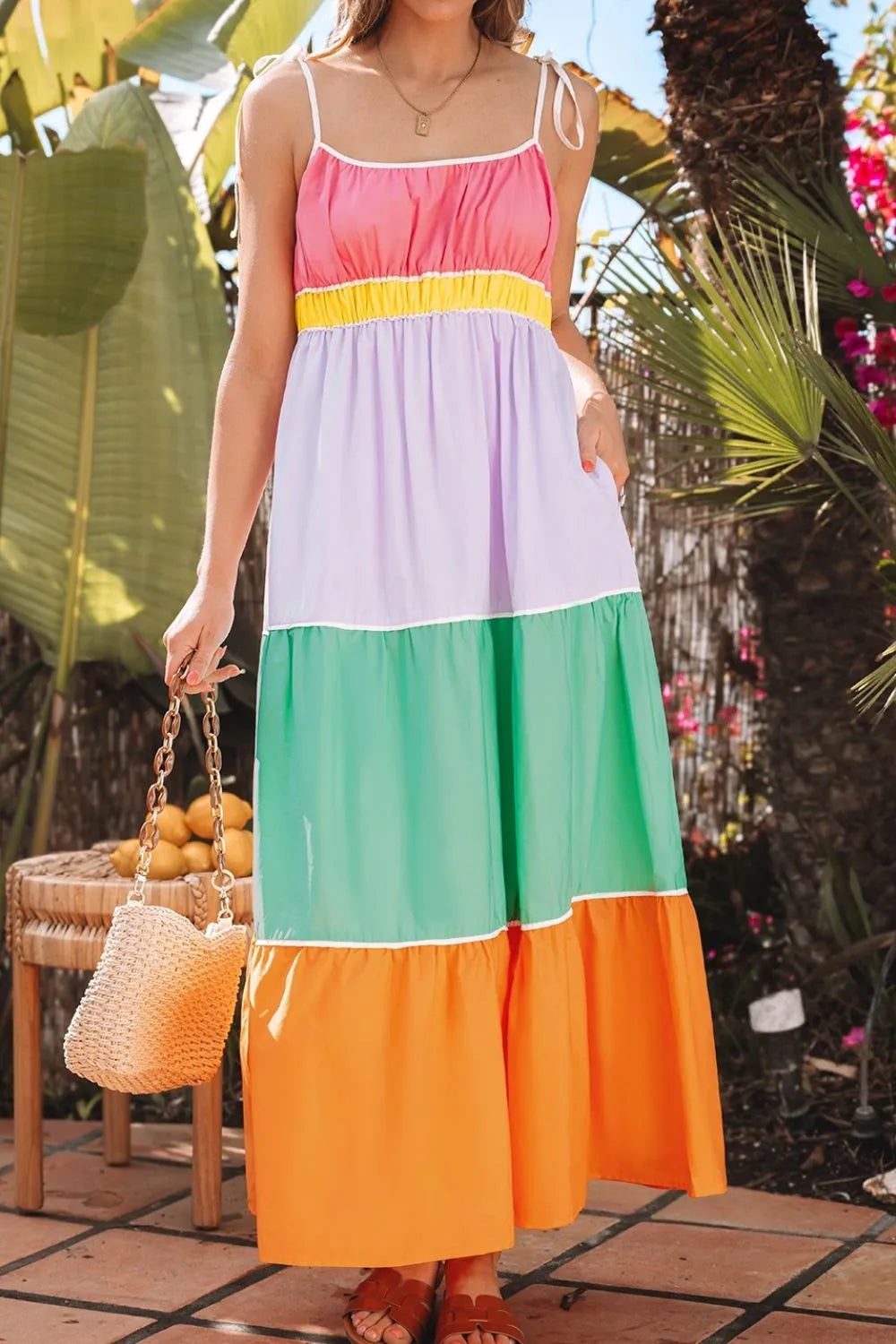 Women's 100% cotton color block tiered maxi dress with pockets, featuring a flowing design and vibrant color panels.