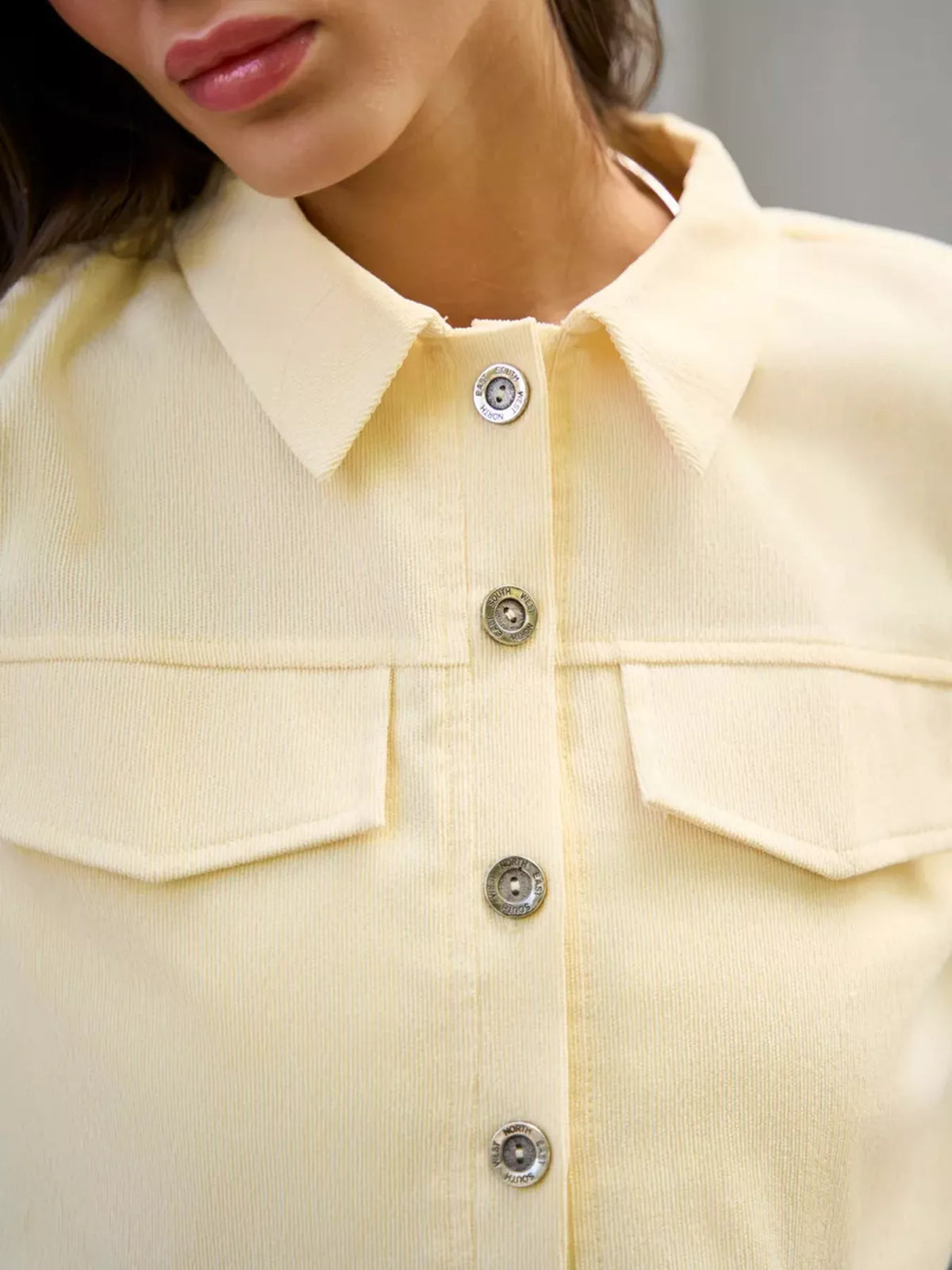 Trendsi cropped jacket and mini skirt set featuring a button-up design, stylish and coordinated for a trendy look.