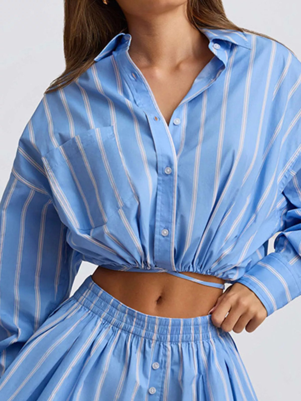 Striped button-up shirt and shorts loungewear set by Plush Fashion Hub, casual and comfortable for relaxing or lounging at home.