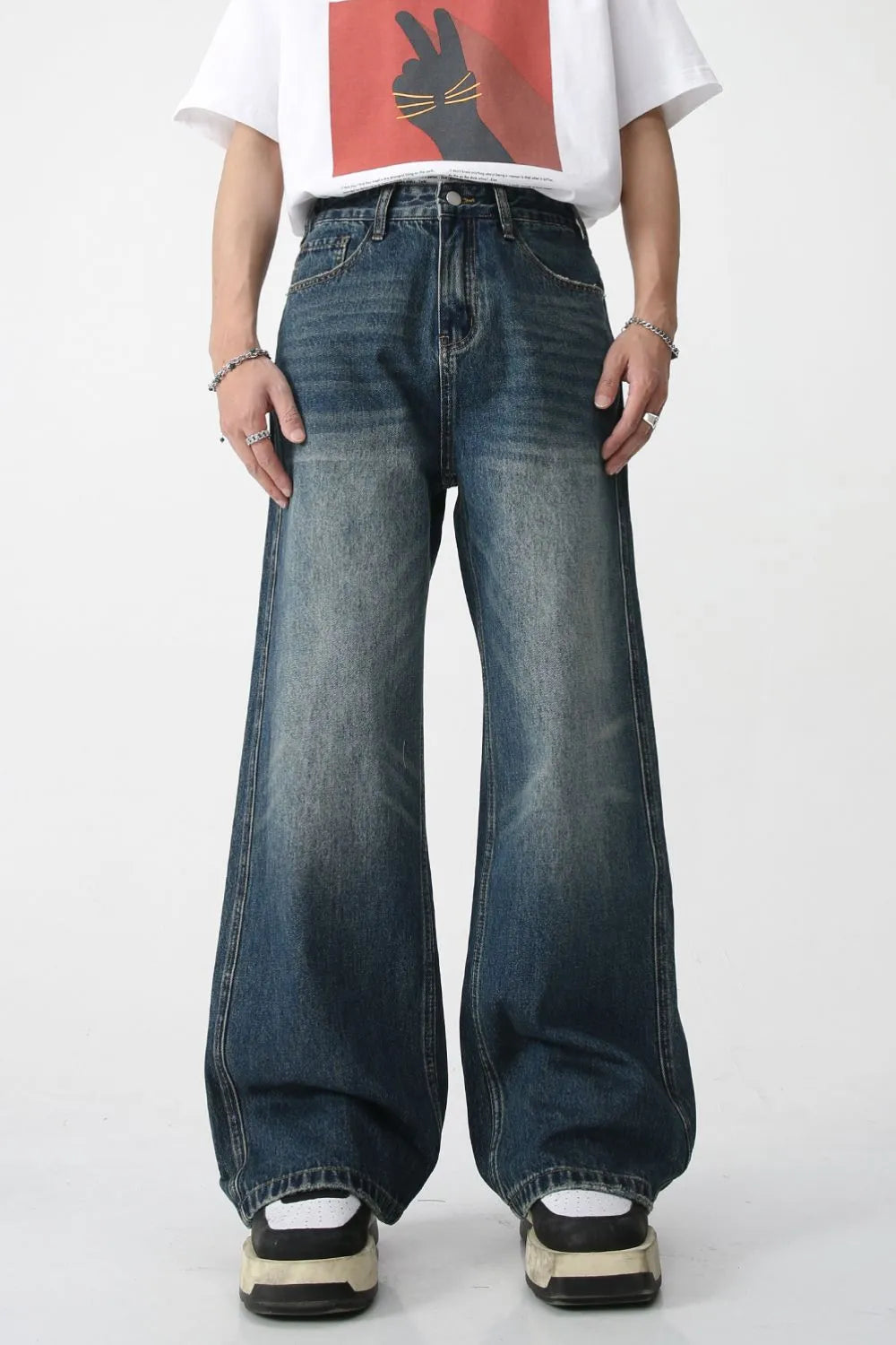 Plush Fashion Hub bootcut denim jeans with front and back pockets, classic blue wash, and relaxed fit.