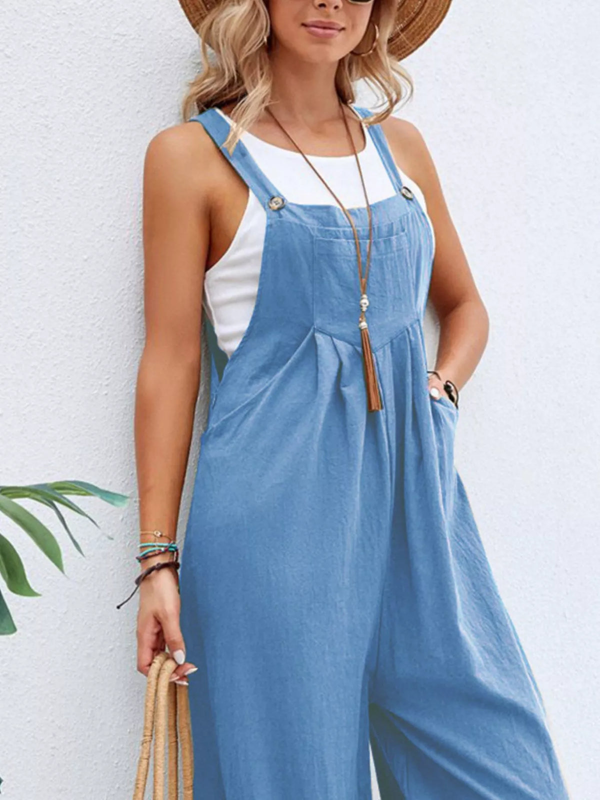 Plus size casual wide-leg jumpsuit with pockets from Plush Fashion Hub, featuring a full-length design and relaxed fit.