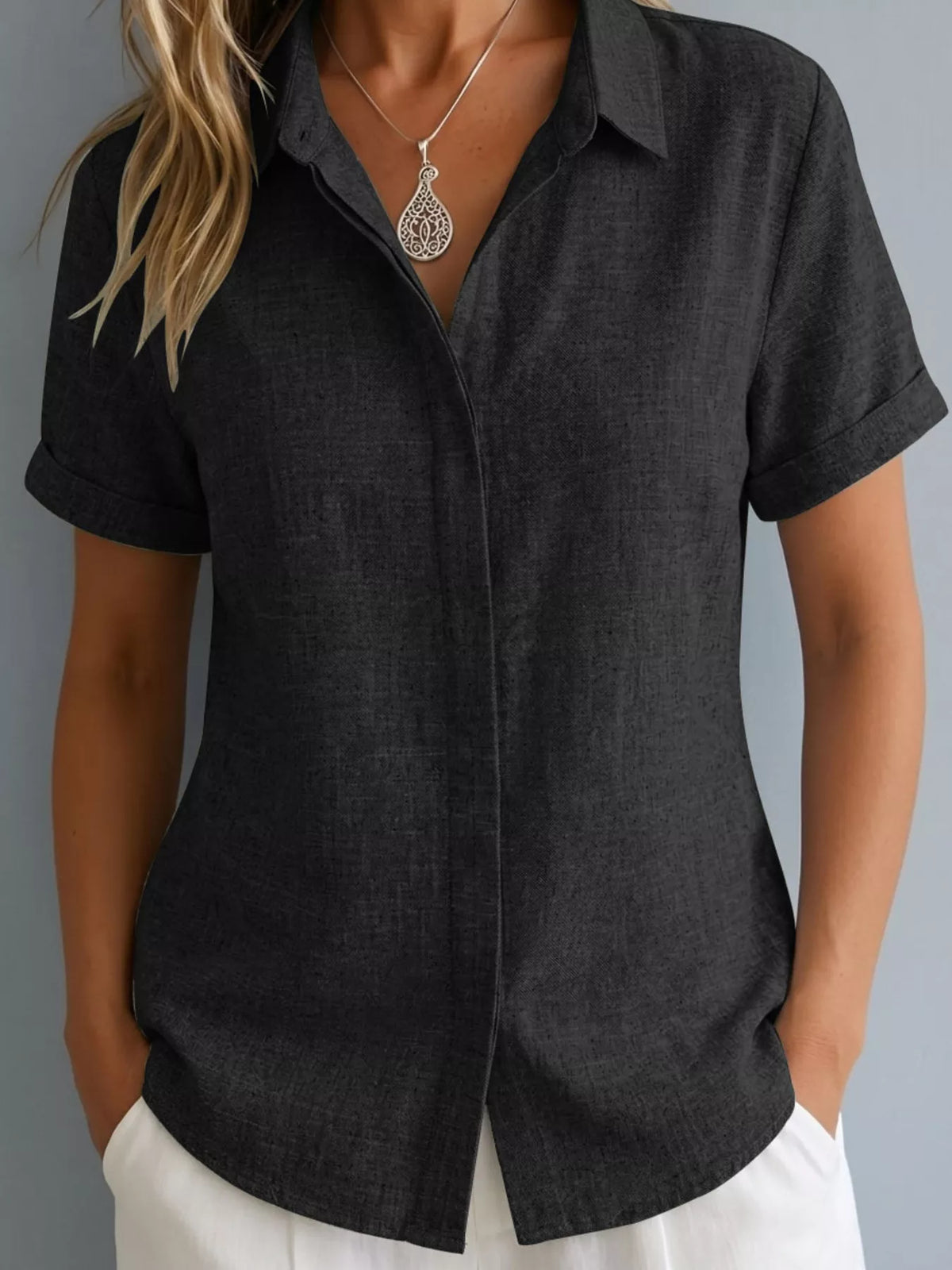 Plus size collared short sleeve shirt from Trendsi, stylish full-size top with a classic collar and short sleeves, shown in the image.