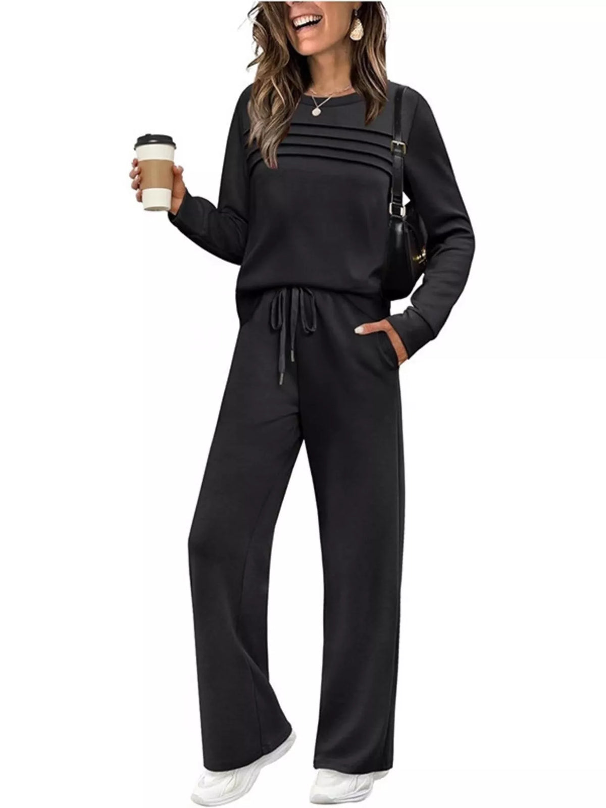 Plus size casual long sleeve crewneck top and drawstring pants matching set by Trendsi, shown in a comfortable, relaxed fit.