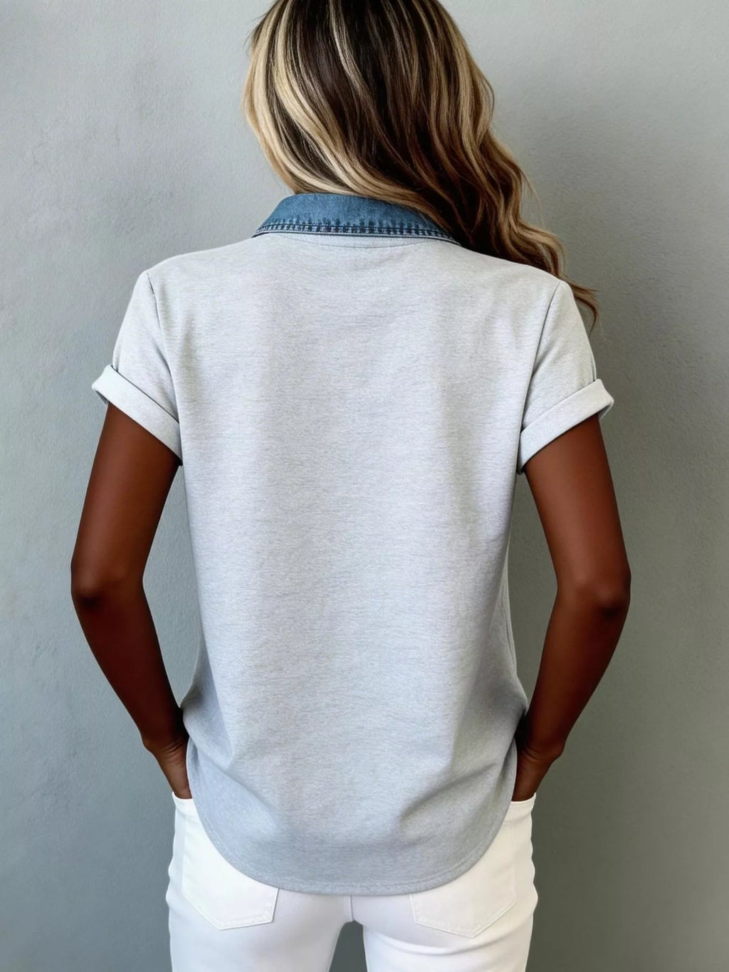 Denim trim short sleeve shirt from Trendsi, casual tops with button closure and denim accents, displayed on a hanger.