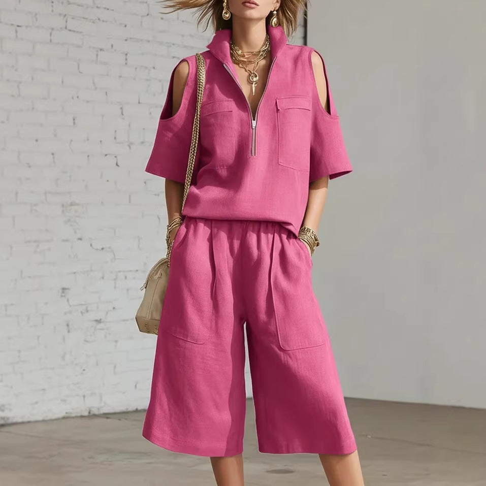 Casual two-piece set with short-sleeve shirt and loose shorts from Plush Fashion Hub, displayed on a model.